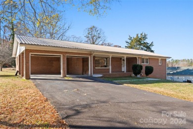 This full brick ranch home featuring 3 bedrooms, 2 full on Club At Irish Creek in North Carolina - for sale on GolfHomes.com, golf home, golf lot