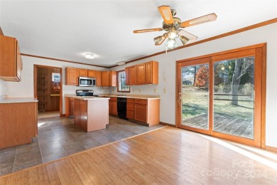 This full brick ranch home featuring 3 bedrooms, 2 full on Club At Irish Creek in North Carolina - for sale on GolfHomes.com, golf home, golf lot