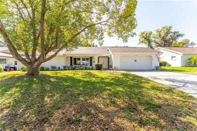 Welcome to this spacious 3-bedroom, 2-bathroom split-plan home on Beacon Woods Golf Club in Florida - for sale on GolfHomes.com, golf home, golf lot