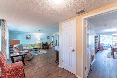 Welcome to this spacious 3-bedroom, 2-bathroom split-plan home on Beacon Woods Golf Club in Florida - for sale on GolfHomes.com, golf home, golf lot