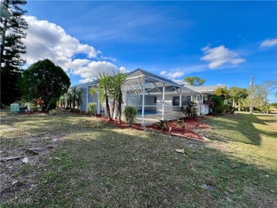 Affordable POOL HOME overlooking the GOLF COURSE. Pay as you on Lehigh Resort Club in Florida - for sale on GolfHomes.com, golf home, golf lot