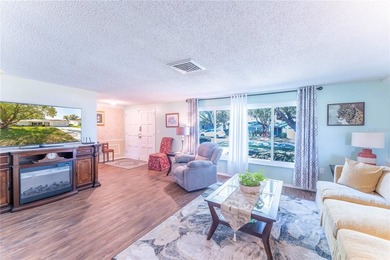 Welcome to this spacious 3-bedroom, 2-bathroom split-plan home on Beacon Woods Golf Club in Florida - for sale on GolfHomes.com, golf home, golf lot