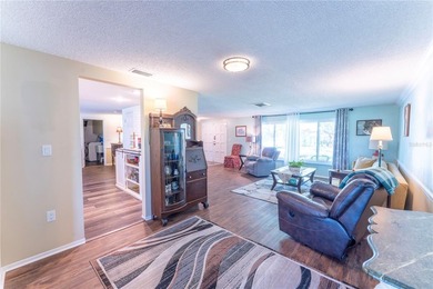 Welcome to this spacious 3-bedroom, 2-bathroom split-plan home on Beacon Woods Golf Club in Florida - for sale on GolfHomes.com, golf home, golf lot