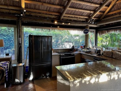 Discover the perfect combination of privacy, space, and luxury on Motorcoach Resort Golf Course in Florida - for sale on GolfHomes.com, golf home, golf lot