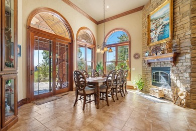 Experience refined living in this exquisite 4-bedroom, 4.5-bath on Highland Springs Country Club in Missouri - for sale on GolfHomes.com, golf home, golf lot