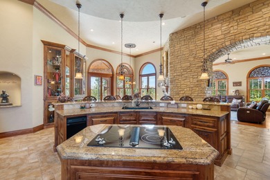 Experience refined living in this exquisite 4-bedroom, 4.5-bath on Highland Springs Country Club in Missouri - for sale on GolfHomes.com, golf home, golf lot