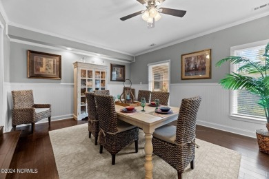 Welcome to this stunning 3-bedroom, 2.5-bathroom brick ranch on Harbour Point Golf Club in North Carolina - for sale on GolfHomes.com, golf home, golf lot