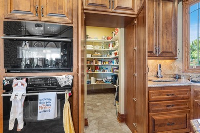 Experience refined living in this exquisite 4-bedroom, 4.5-bath on Highland Springs Country Club in Missouri - for sale on GolfHomes.com, golf home, golf lot