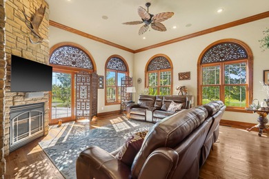 Experience refined living in this exquisite 4-bedroom, 4.5-bath on Highland Springs Country Club in Missouri - for sale on GolfHomes.com, golf home, golf lot