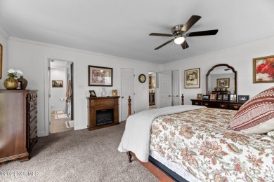 Welcome to this stunning 3-bedroom, 2.5-bathroom brick ranch on Harbour Point Golf Club in North Carolina - for sale on GolfHomes.com, golf home, golf lot