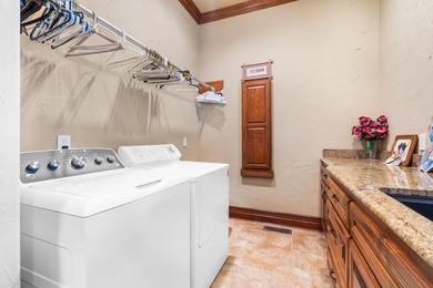 Experience refined living in this exquisite 4-bedroom, 4.5-bath on Highland Springs Country Club in Missouri - for sale on GolfHomes.com, golf home, golf lot