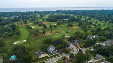Discover the ease of single-level living with stunning vistas of on Country Club of Detroit - Regulation in Michigan - for sale on GolfHomes.com, golf home, golf lot