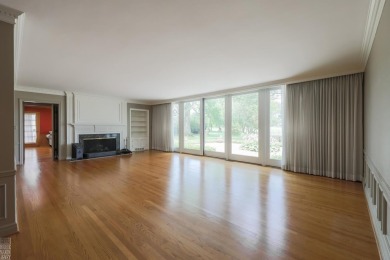 Discover the ease of single-level living with stunning vistas of on Country Club of Detroit - Regulation in Michigan - for sale on GolfHomes.com, golf home, golf lot