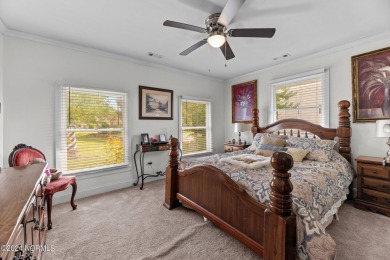 Welcome to this stunning 3-bedroom, 2.5-bathroom brick ranch on Harbour Point Golf Club in North Carolina - for sale on GolfHomes.com, golf home, golf lot