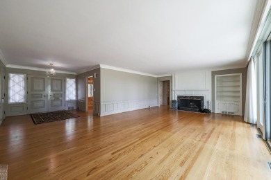 Discover the ease of single-level living with stunning vistas of on Country Club of Detroit - Regulation in Michigan - for sale on GolfHomes.com, golf home, golf lot