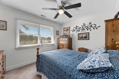 Welcome to this stunning 3-bedroom, 2.5-bathroom brick ranch on Harbour Point Golf Club in North Carolina - for sale on GolfHomes.com, golf home, golf lot