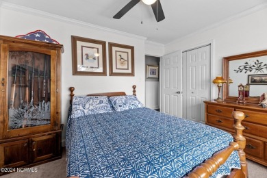 Welcome to this stunning 3-bedroom, 2.5-bathroom brick ranch on Harbour Point Golf Club in North Carolina - for sale on GolfHomes.com, golf home, golf lot