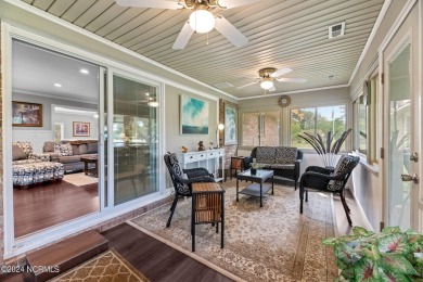 Welcome to this stunning 3-bedroom, 2.5-bathroom brick ranch on Harbour Point Golf Club in North Carolina - for sale on GolfHomes.com, golf home, golf lot