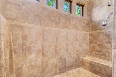 Experience refined living in this exquisite 4-bedroom, 4.5-bath on Highland Springs Country Club in Missouri - for sale on GolfHomes.com, golf home, golf lot