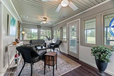 Welcome to this stunning 3-bedroom, 2.5-bathroom brick ranch on Harbour Point Golf Club in North Carolina - for sale on GolfHomes.com, golf home, golf lot