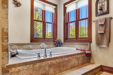 Experience refined living in this exquisite 4-bedroom, 4.5-bath on Highland Springs Country Club in Missouri - for sale on GolfHomes.com, golf home, golf lot