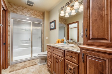 Experience refined living in this exquisite 4-bedroom, 4.5-bath on Highland Springs Country Club in Missouri - for sale on GolfHomes.com, golf home, golf lot