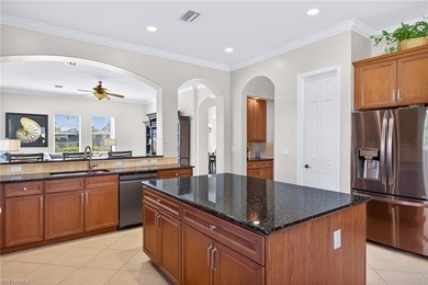 Experience golf-course living in this spacious 5-bedroom, 4 on Valencia Golf and Country Club in Florida - for sale on GolfHomes.com, golf home, golf lot