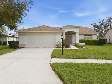 Well-maintained furnished 3-bedroom, 2-bath home with no rear on Heritage Pines Country Club in Florida - for sale on GolfHomes.com, golf home, golf lot