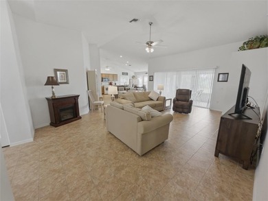 Well-maintained furnished 3-bedroom, 2-bath home with no rear on Heritage Pines Country Club in Florida - for sale on GolfHomes.com, golf home, golf lot
