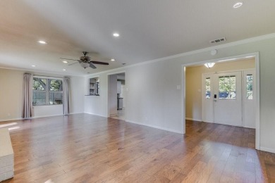 This 3-bedroom, 2-bathroom home is nestled in the highly coveted on Pecan Plantation Country Club in Texas - for sale on GolfHomes.com, golf home, golf lot