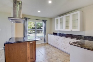 This 3-bedroom, 2-bathroom home is nestled in the highly coveted on Pecan Plantation Country Club in Texas - for sale on GolfHomes.com, golf home, golf lot