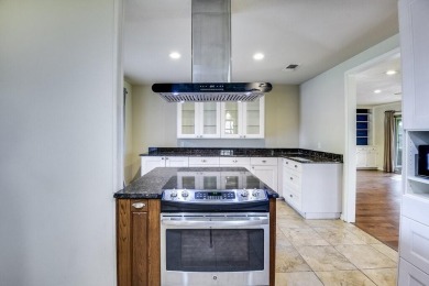 This 3-bedroom, 2-bathroom home is nestled in the highly coveted on Pecan Plantation Country Club in Texas - for sale on GolfHomes.com, golf home, golf lot