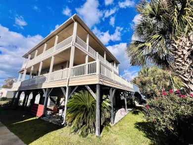 CUSTOM BUILT OCEAN VIEW KEY WEST BEACH HOUSE WITH WRAPAROUND on Prestwick Country Club in South Carolina - for sale on GolfHomes.com, golf home, golf lot