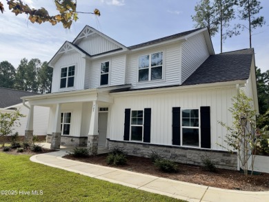 Welcome to your dream home! This stunning 2,352 square foot on Woodlake Country Club in North Carolina - for sale on GolfHomes.com, golf home, golf lot