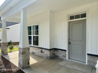 Welcome to your dream home! This stunning 2,352 square foot on Woodlake Country Club in North Carolina - for sale on GolfHomes.com, golf home, golf lot