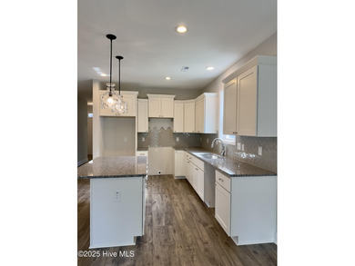 Welcome to your dream home! This stunning 2,352 square foot on Woodlake Country Club in North Carolina - for sale on GolfHomes.com, golf home, golf lot