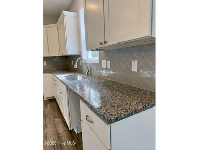 Welcome to your dream home! This stunning 2,352 square foot on Woodlake Country Club in North Carolina - for sale on GolfHomes.com, golf home, golf lot