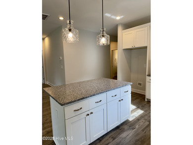 Welcome to your dream home! This stunning 2,352 square foot on Woodlake Country Club in North Carolina - for sale on GolfHomes.com, golf home, golf lot