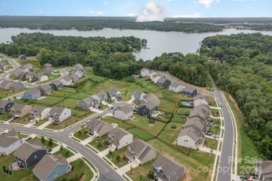 Welcome to this stunning home nestled in the Lanters in the on The Palisades Country Club in North Carolina - for sale on GolfHomes.com, golf home, golf lot