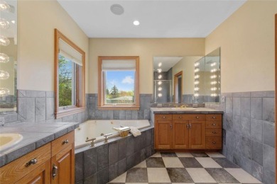 Welcome to this meticulously maintained, stately home just steps on Faribault Golf and Country Club in Minnesota - for sale on GolfHomes.com, golf home, golf lot
