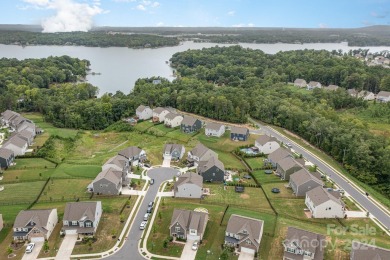 Welcome to this stunning home nestled in the Lanters in the on The Palisades Country Club in North Carolina - for sale on GolfHomes.com, golf home, golf lot