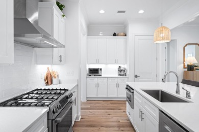 This exceptional like new single-story home showcases on Origins Golf Club in Florida - for sale on GolfHomes.com, golf home, golf lot