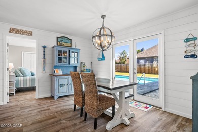 Welcome to this beautifully remodeled three-bedroom, two-bath on Bay Point Resort Golf Club in Florida - for sale on GolfHomes.com, golf home, golf lot