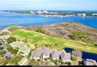 Enjoy Sandestin living in this pristine townhome that overlooks on Sandestin Golf and Beach Resort - The Links in Florida - for sale on GolfHomes.com, golf home, golf lot
