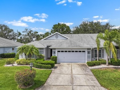 Welcome home to this delightful 2-bedroom, 2-bath villa that on Scepter Golf Club in Florida - for sale on GolfHomes.com, golf home, golf lot
