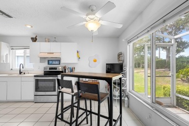 Welcome home to this delightful 2-bedroom, 2-bath villa that on Scepter Golf Club in Florida - for sale on GolfHomes.com, golf home, golf lot