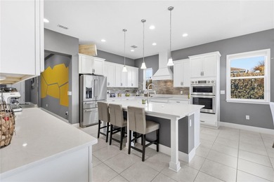 Quiet Luxury Living in Eagle Creek | Golf Course Community | on Eagle Creek Golf Club in Florida - for sale on GolfHomes.com, golf home, golf lot