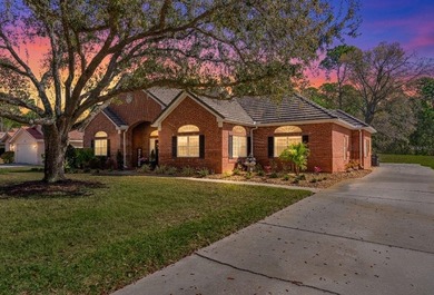 Welcome to this beautifully remodeled brick estate nestled on a on East Lake Woodlands Country Club in Florida - for sale on GolfHomes.com, golf home, golf lot