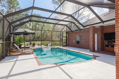 Welcome to this beautifully remodeled brick estate nestled on a on East Lake Woodlands Country Club in Florida - for sale on GolfHomes.com, golf home, golf lot