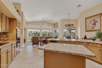 Charming home w/stone facade + extended paver front courtyard on Arizona Traditions Golf Club in Arizona - for sale on GolfHomes.com, golf home, golf lot